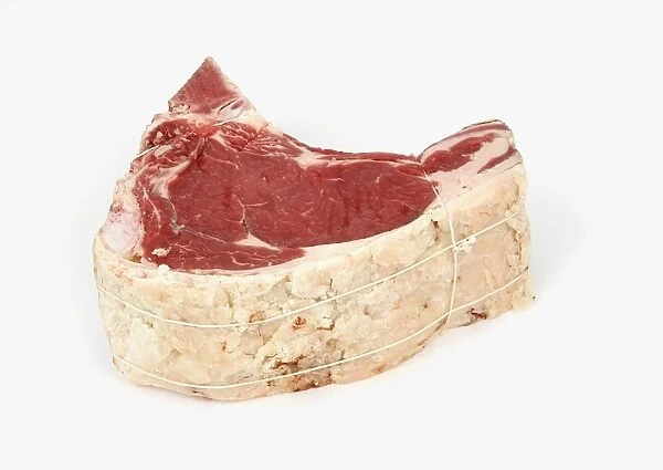 Sirloin steak on white background, close-up