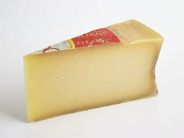 Slice of Spanish Flor de Guia ewe and cows milk cheese