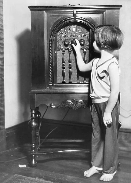 Small Girl Tuning Radio