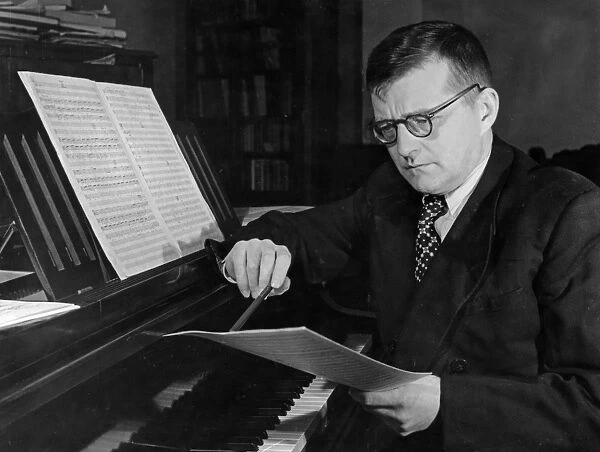 Soviet composer, dmitri shostakovich, working at his piano, 1950, he won the stalin prize for his oratorio song of the woods and the music to the film the fall of berlin