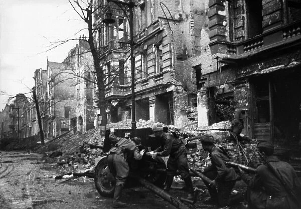 Soviet red army soldiers engaged in street fighting in berlin, germany during world war 2, 1945