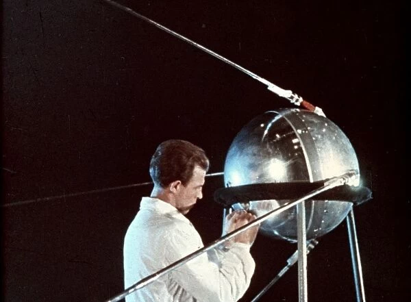 Soviet technician working on sputnik 1, 1957