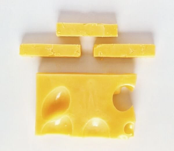 A square of cheese with holes
