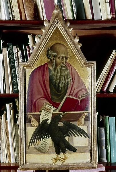St John the Evangelist shown with his symbol, the eagle. Artist, Giovanni de Paolo (14th century)