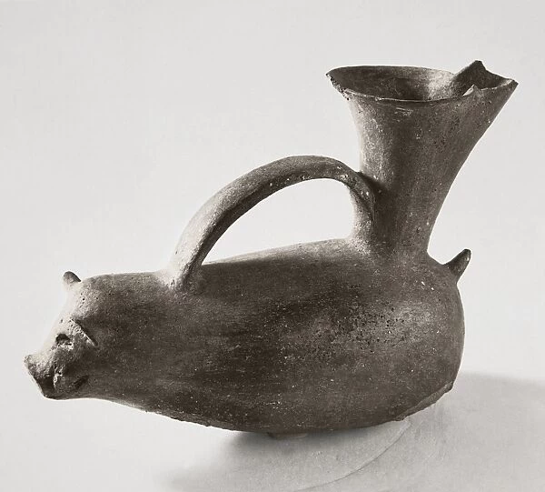 Terracotta vessel in shape of pig
