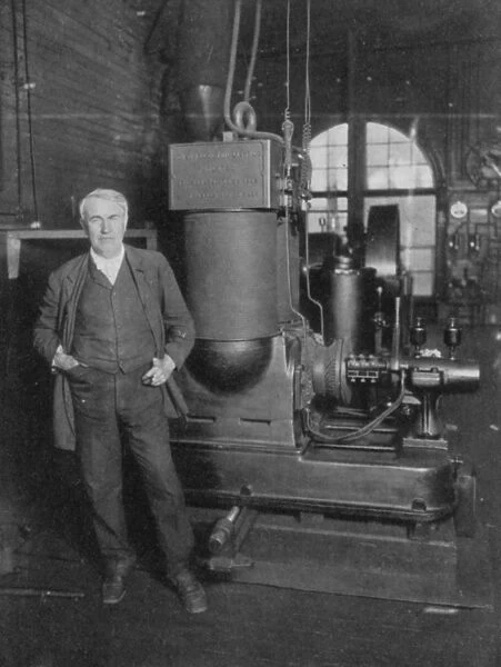 Thomas Alva Edison (1847-1931) American inventor, with his first dynamo for producing