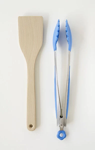 Tongs and wooden spatula
