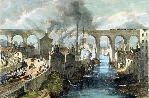Train crossing Stockport viaduct on London & North Western Railway. Note pollution of river banks