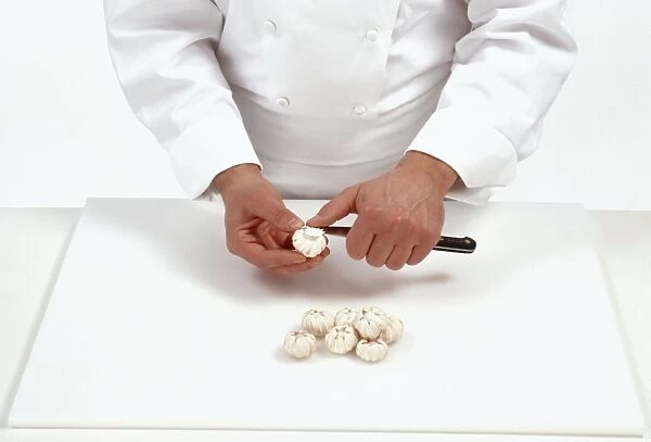 Turning mushrooms, using paring knife, close-up