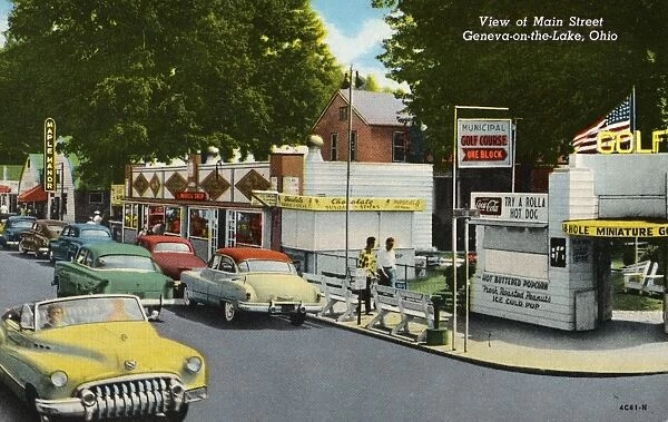 Vehicles Traveling on Main Street. ca. 1954, Geneva-on-the-Lake, Ohio, USA, View of Main Street. Geneva -on-the-Lake, Ohio