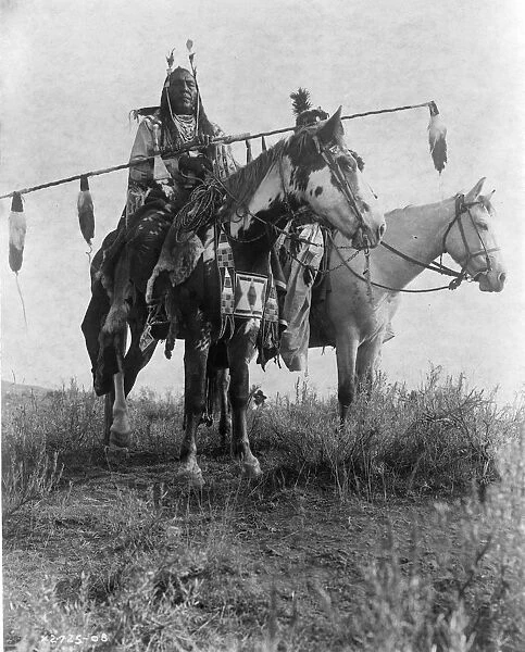 Village criers on horseback, Bird On the Ground and Forked Iron, Crow Indians, Montana