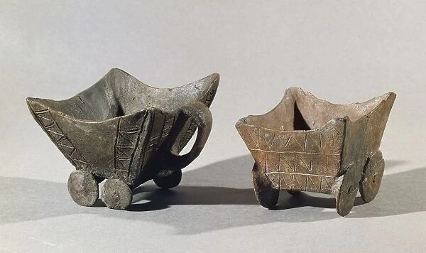 Wagon shaped clay pots from Budakalasz