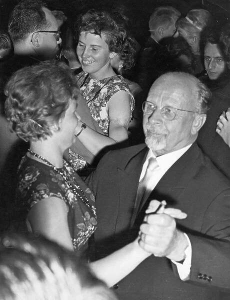 Walter ulbricht, first secretary of the socialist unity party (sed) central committee and gdr state council chairman, dancing with soviet cosmonaut valentina tereshkova during the cosmonaut ball in honor of tereshkova and gagarin, berlin, gdr, october 19, 1963