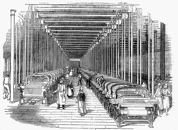 Weaving shed fitted rows with power looms driven by belt and shafting. Wood engraving