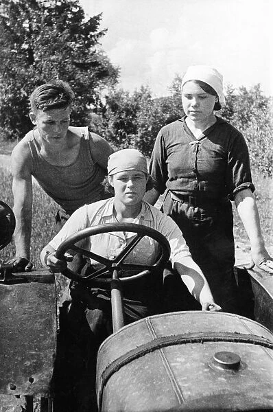 Women collective farmers learning to drive tractors in order to replace the men who have gone to the front, world war ll, ussr, august 1941