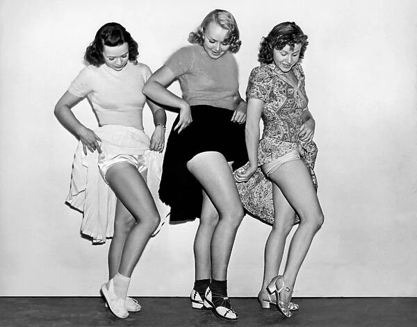 Three Women Lift Their Skirts