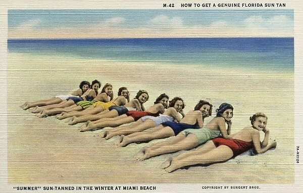 Women Sunbathing on a Beach. ca. 1937, Miami Beach, Florida, USA, M-42 HOW TO GET A GENUINE FLORIDA SUN TAN. SUMMER SUN-TANNED IN THE WINTER AT MIAMI BEACH