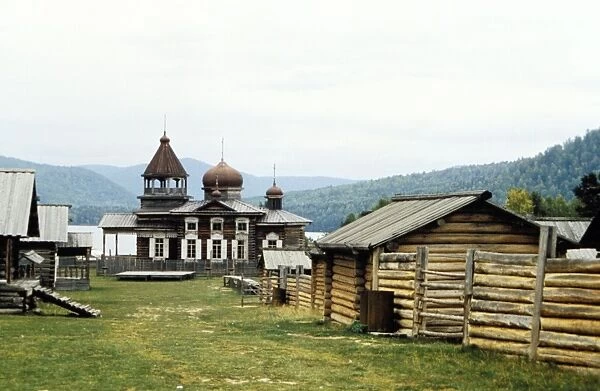 Wooden church and houses in irkutsk, siberia, russia, open-air museum of wooden architecture, 17th or 18th centuries