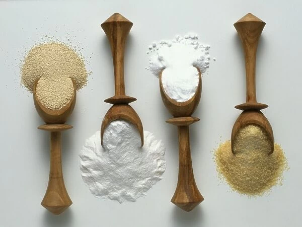 Four wooden spoons of ground yeast and gelatine, baking powder, and bicarbonate of soda