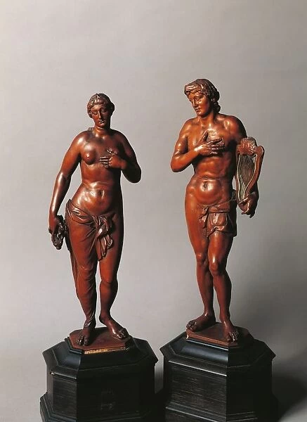 Wooden statuettes of Orpheus and Eurydice