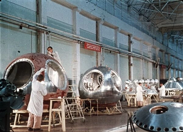 Work being done on the vostok 1 capsule in preparation for gagarins historic flight, 1961, this is a still from a soviet film about the space program