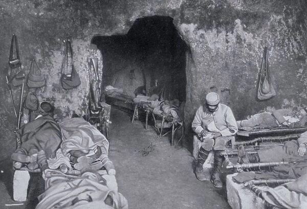 World War I 1914-1918: French soldiers resting in a grotto in a trench complex. Most