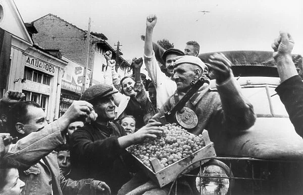 world war ll, soldiers of the third ukrainian front being welcomed in a bulgarian town, september 1944
