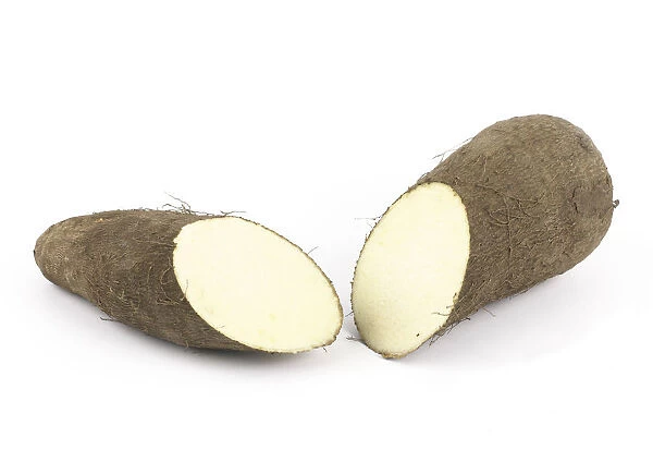 Yam cut into half on white background