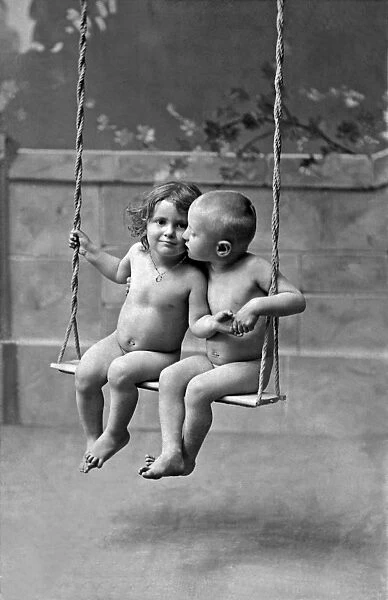 Young French Lovers On A Swing