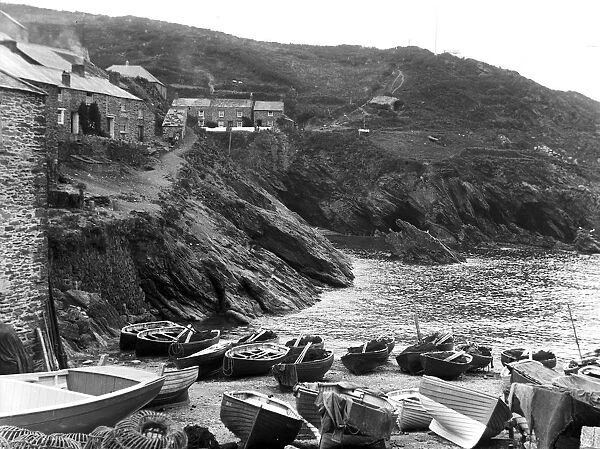 View down slipway to boats and cliff beyond, Portloe, Veryan, Cornwall. 21st August 1911