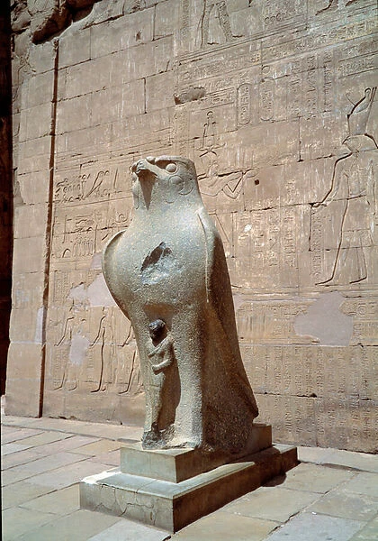 Ancient art: the god hawk Horus in the temple of Edfu, Egypt. Sculpture
