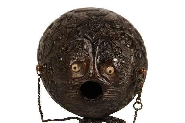 Carved coconut powder flask bugbear, Spanish Colonial, early 19th century (coconut)