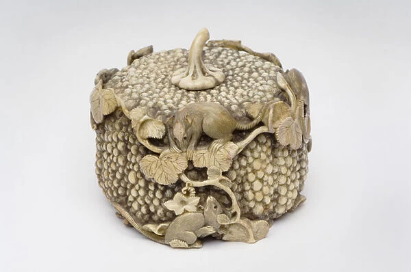 Okimono carved as four playful rats jumping over a pumpkin (ivory)