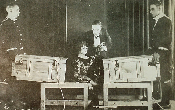 P T Selbit, the British magician, sawing a woman in two (photo)