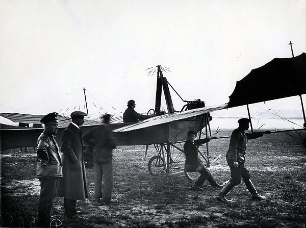 A plane taking off or landing on an airfield near St. Petersburg, 1911 (b  /  w photo)