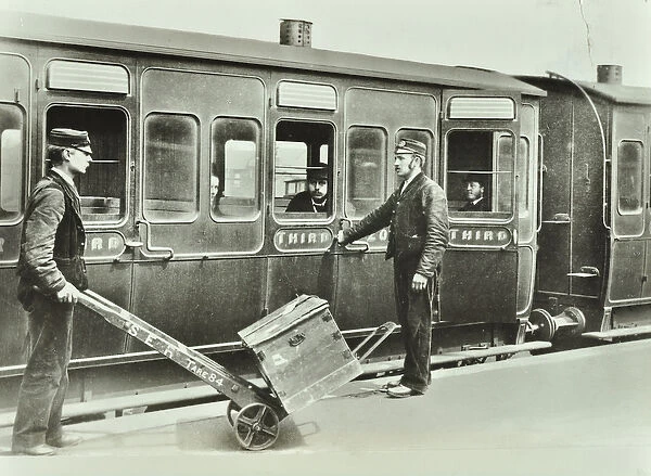 Platform Porters at a railway station, 1885 (b  /  w photo)