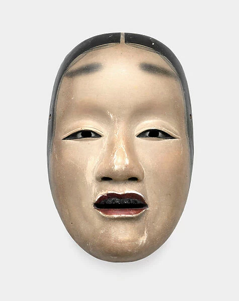 A wood mask with gofun ground, painted with sumi for the hair