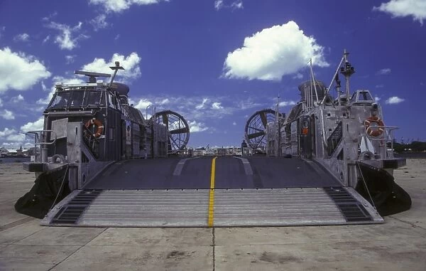 A landing craft air cushion is deflated on a ramp in Pearl Harbor, Hawaii