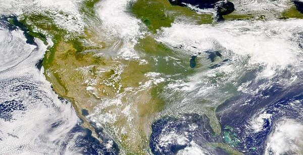Satellite view of North America with smoke visible in several locations