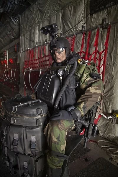 U. S. Navy Seal combat diver prepares for HALO jump operations