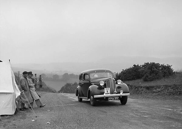 Dodge saloon of AT Morse competing in the South Wales Auto Club Welsh Rally, 1937 Artist
