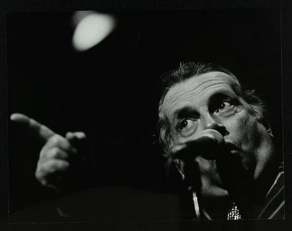 George Melly on stage at the Forum Theatre, Hatfield, Hertfordshire, 8 April 1983