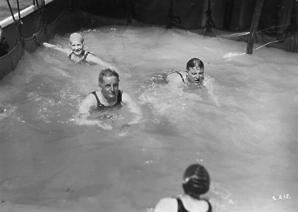 Passengers in the swimming pool on board a cruise ship, c1920s-c1930s(?)