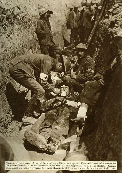 Wounded soldier being treated in the trenches, Battle of the Somme, First World War, 1916, (1935)