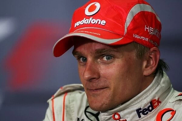 Formula One World Championship: Third placed Heikki Kovalainen McLaren in the post race FIA Press Conference