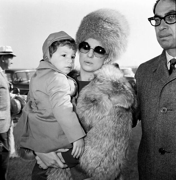 Barbra Streisand arrives at Heathrow Airport with her son Jason Gould