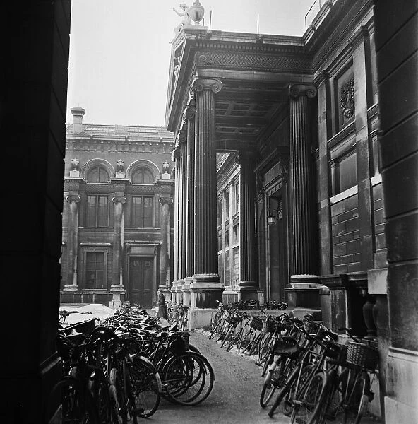 Bicycles parked outside one of the University colleges in Oxford. Circa 1950
