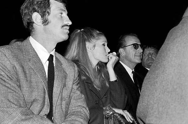 Brian London v. Cassius Clay: Actress Ursula Andress watching the fight