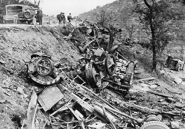 French soldiers inspect a destroyed German 5th Army transport column near Esperia