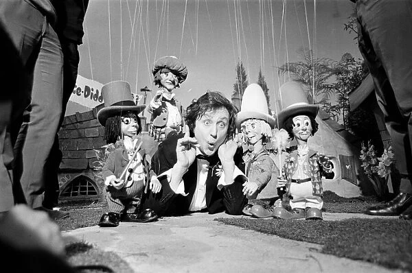 Ken Dodd in the Diddy Village with the props for his new children show for the BBC